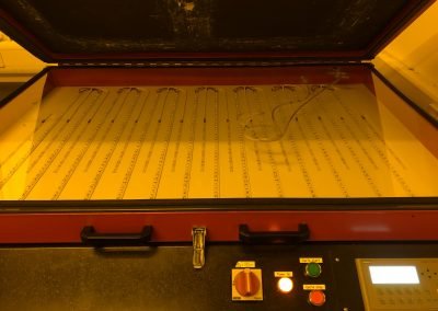 Automated vacuum UV exposure unit control circuit modifications with HMI interface