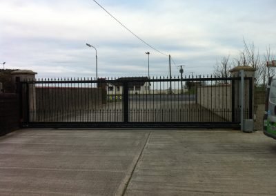 Automated sliding gate installation c/w encoder and safety devices